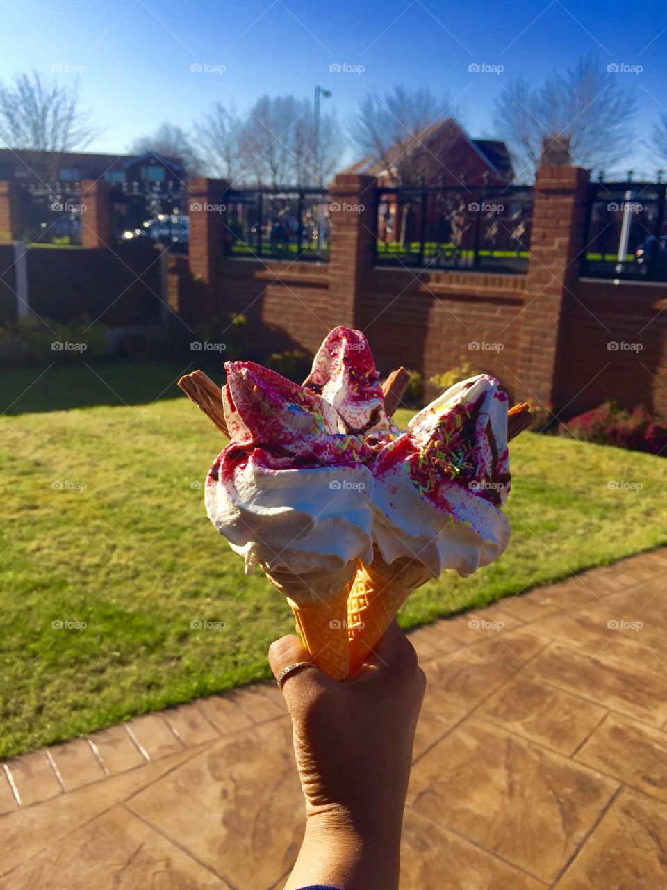 Hand holding ice cream 