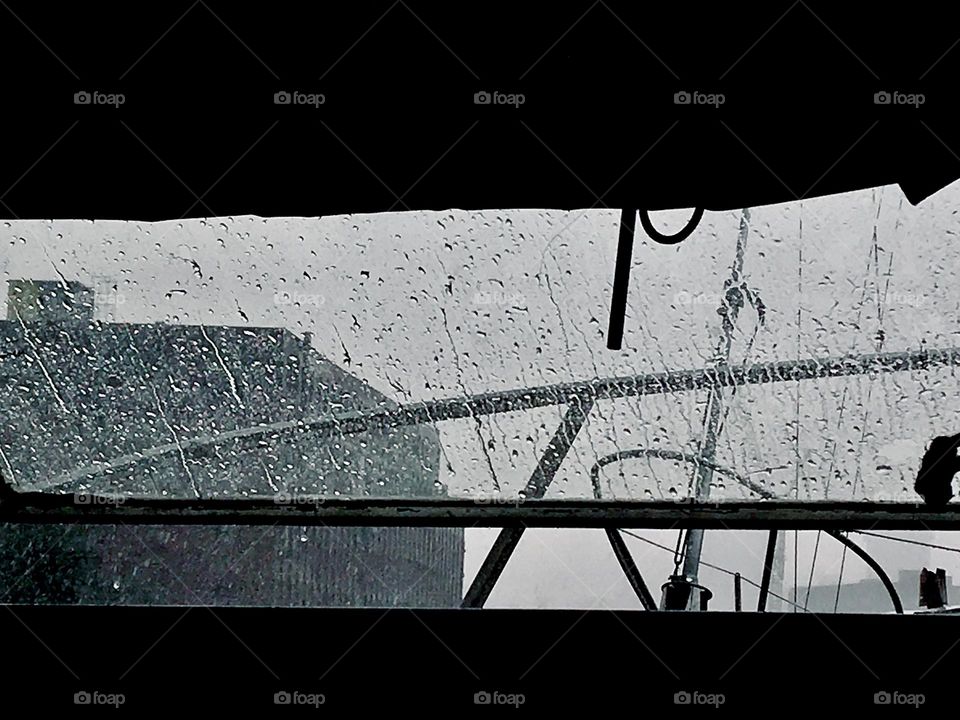  View from aboard the “Salvation” #2, the motorboat we own at Newtown Creek in Long Island City, Queens, NY looking out at a rather rainy scenery on a late afternoon in November 2021. Hypnotic Productions