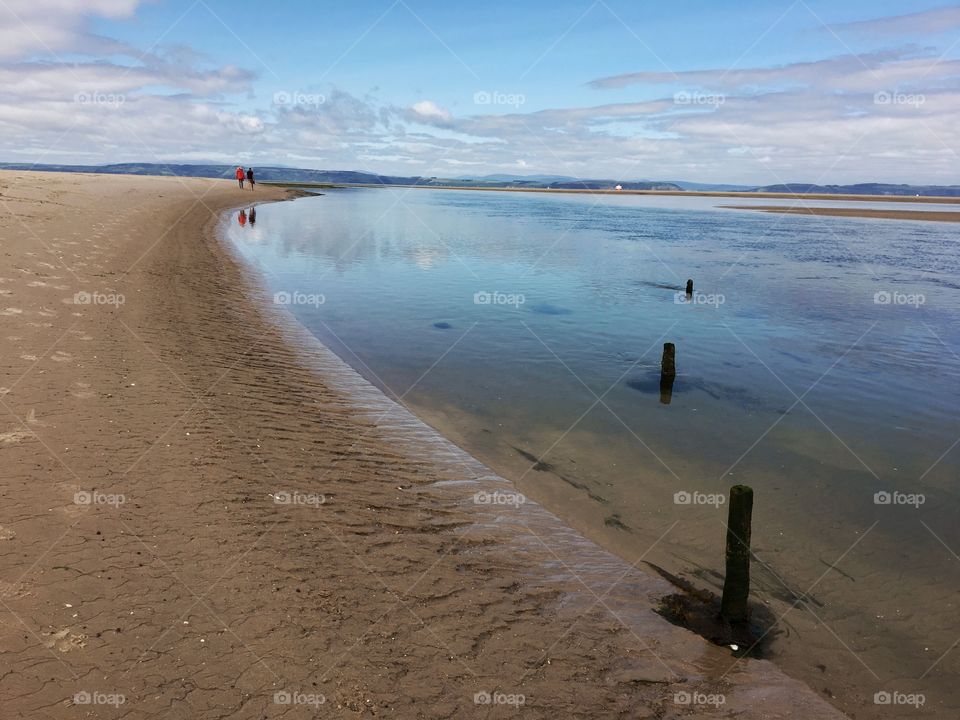 Beautiful Findhorn beach ... Bonnie Bonnie Scotland .. groynes in the foreground a couple walking in the distance ... hope you like my composition