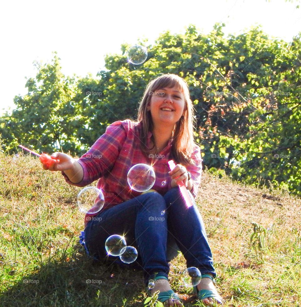 Smile and soap bubbles