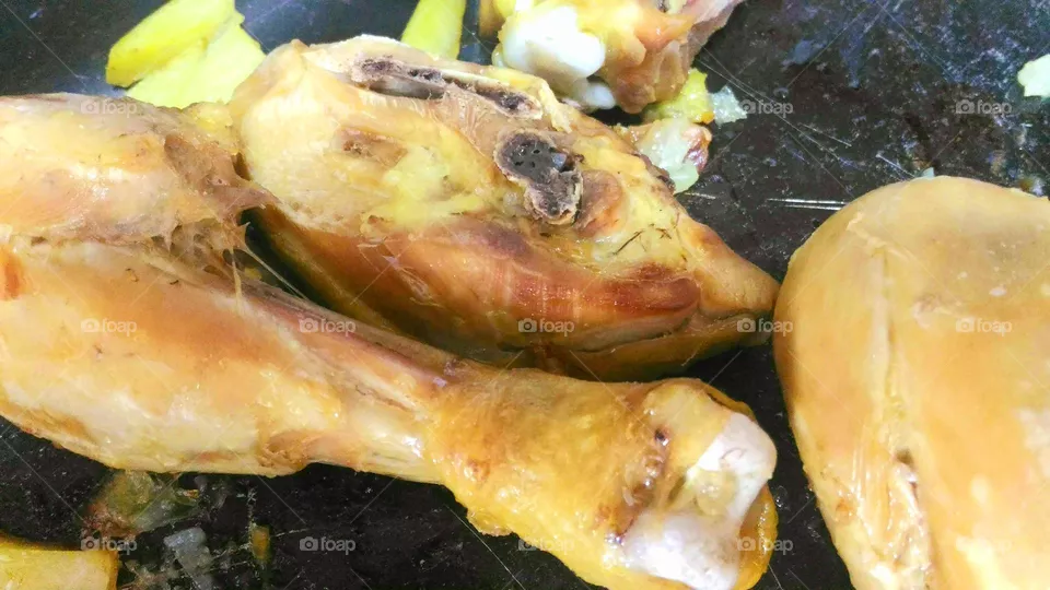 Roasted chicken thighs with some potatoes