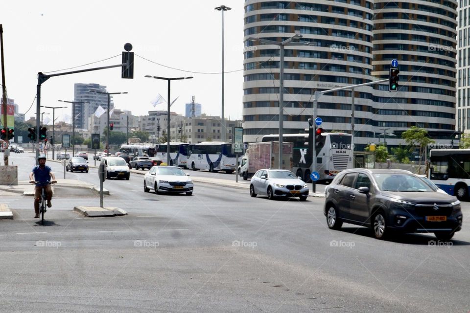 Cars crossing big junction at the city