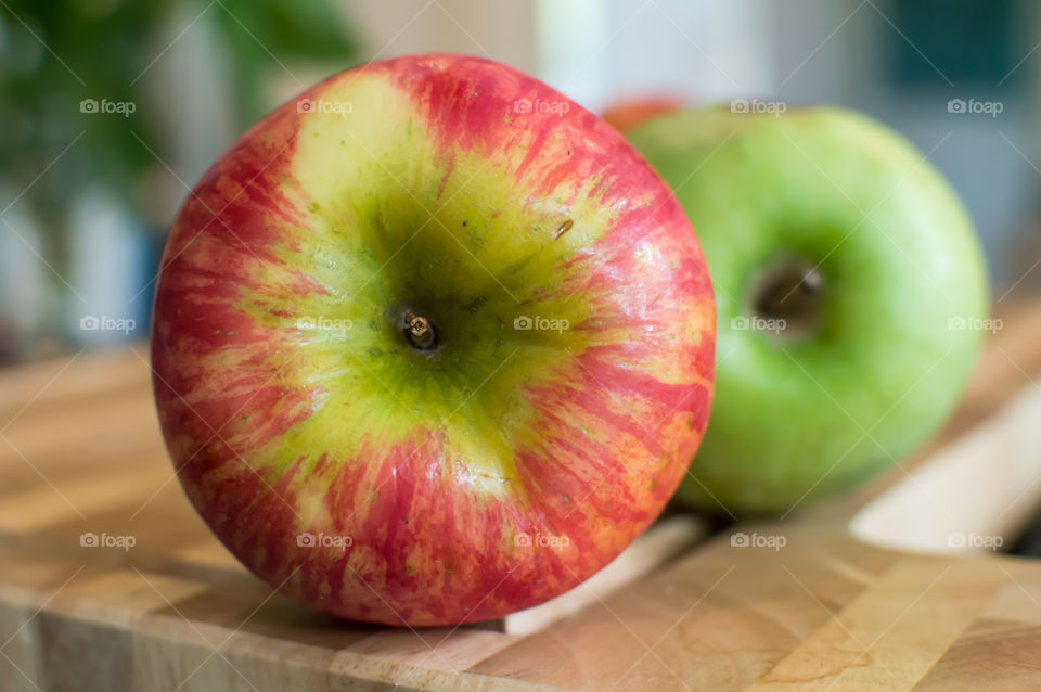 Closeup of apples on wood low angle view still life beautiful food photography and healthy food choices and diet background 