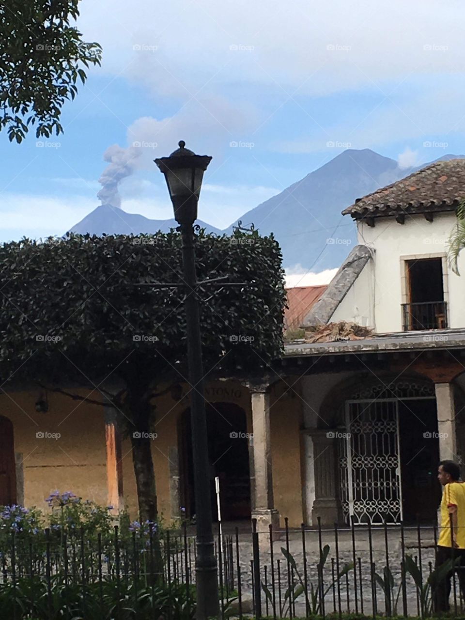 Guatemala, Volcano Fuego Smoking and a architectural church building