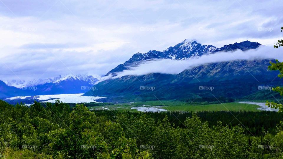 Matanuska Glacier in the Chugash Mountain Range, ALaska sparkles in the afternoon summer sun.