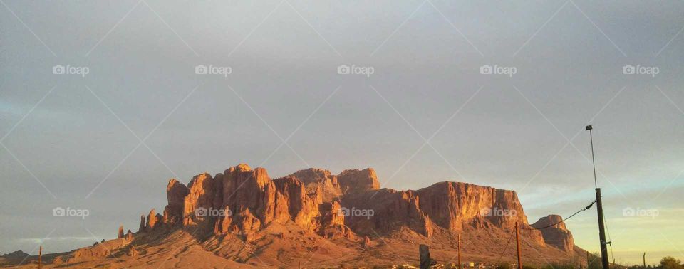 A Golden Summer Sunset on the Superstition Mountains, Apache Junction, Arizona, USA

Instagram username; anita.walter.796