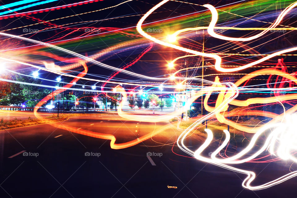 Late nite time exposure photographic experimenting with traffic lights create a funky psychedelic visual effect.