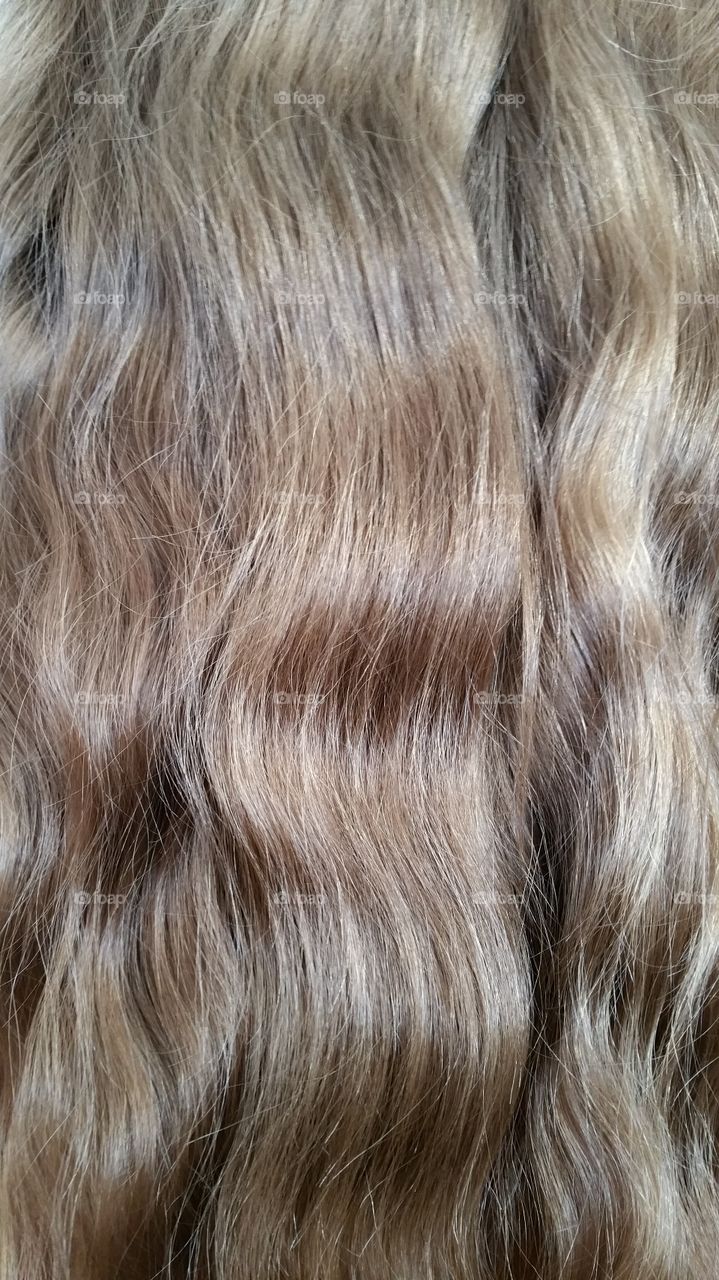 long hair of a child in waves