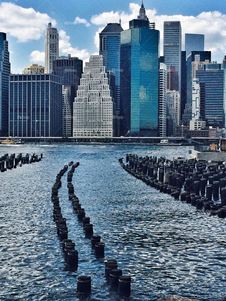 Manhattan skyline. Manhattan skyline shot from Brooklyn bridge park