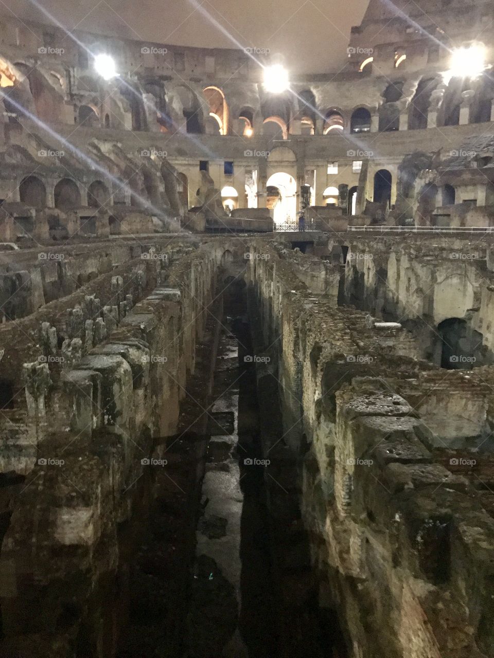 Standing on the arena floor of the Colosseum, this ancient wonder, was captivating!