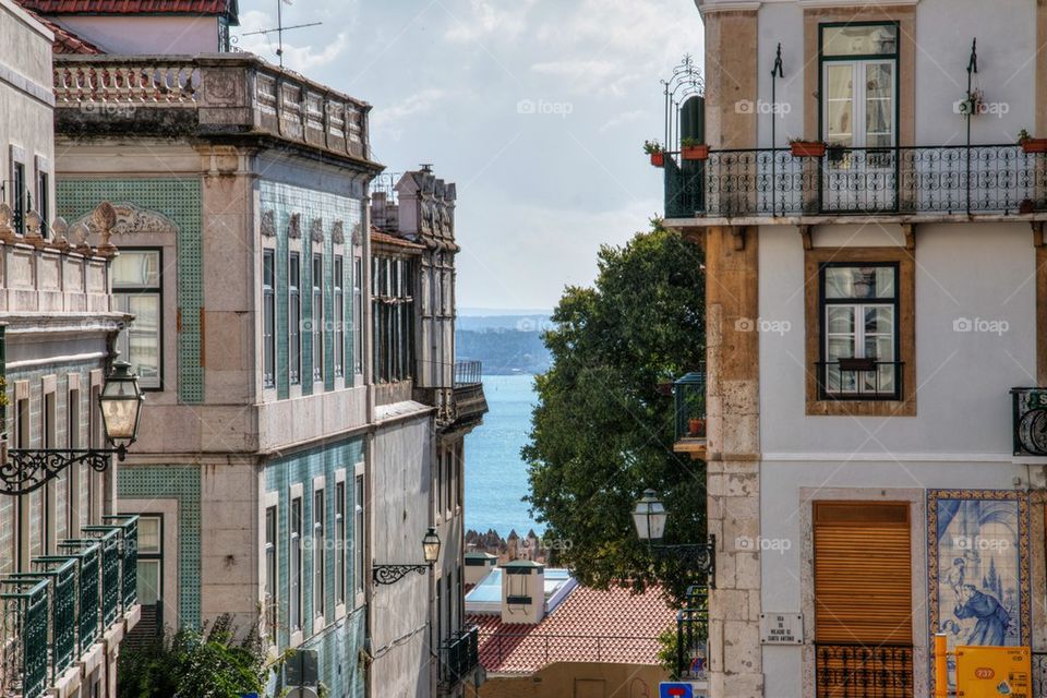 Tagus river through the buildings 