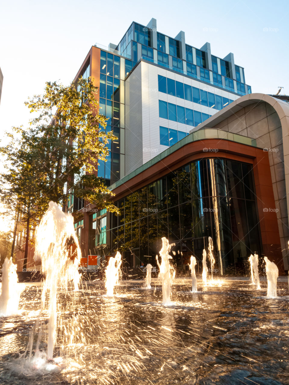 Modern walking passage with fountain in Regent Place Square. London. UK.