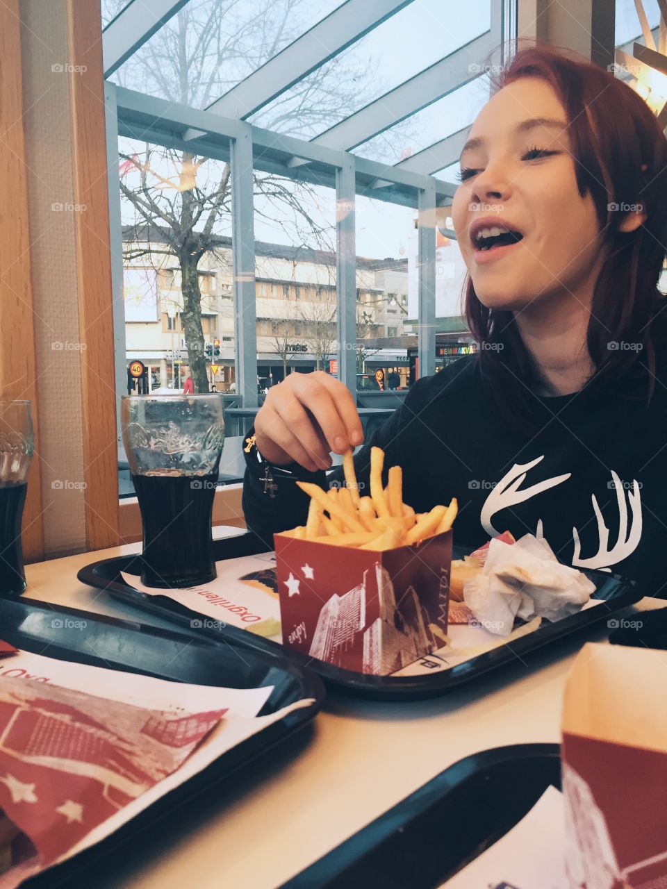 Girl having fun at the restaurant