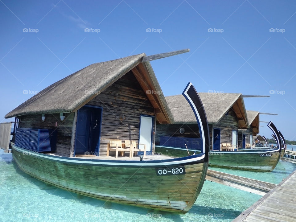 Cocoa Island Resort Overwater Bungalows