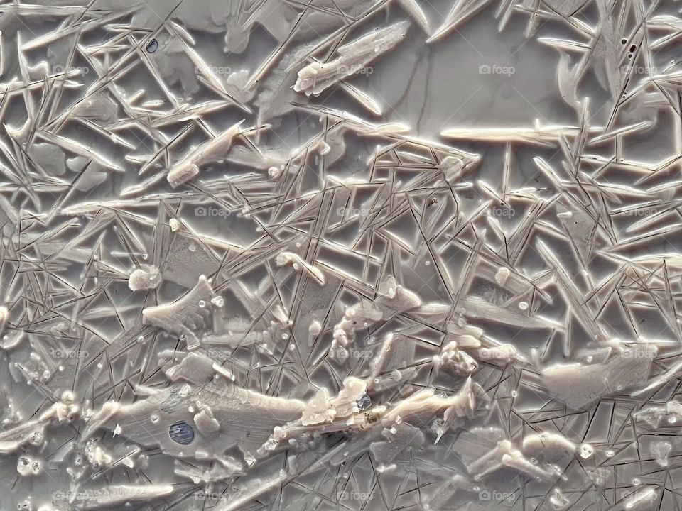 Ice crystals forming in a muddy roadway as the evening sets in, make for an absolutely gorgeous macro shot 