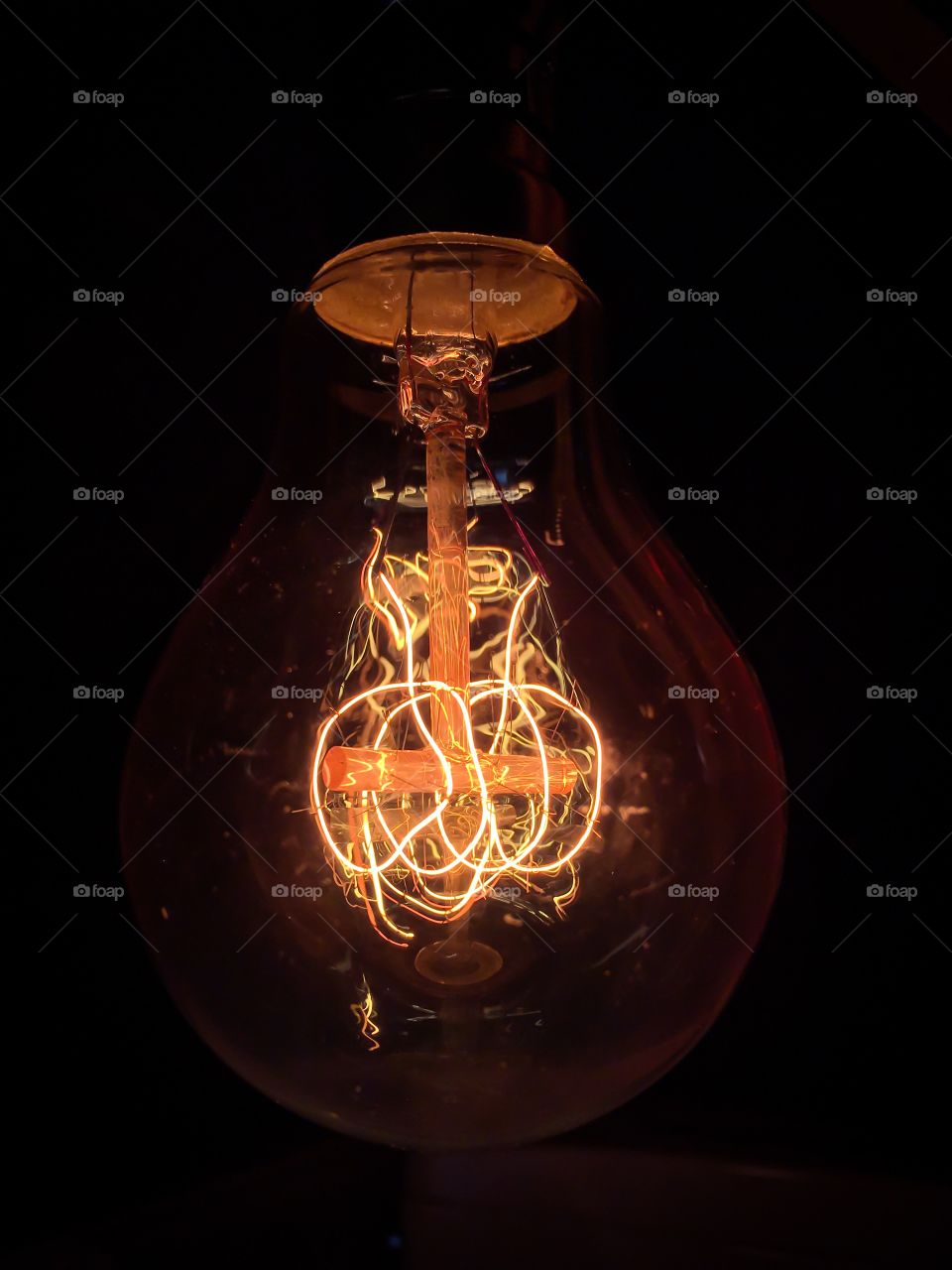 Close-up of illuminated lightbulb