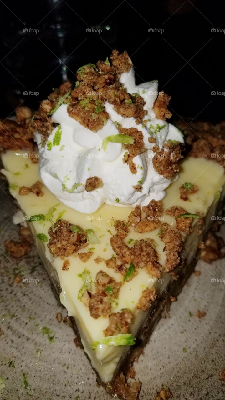 delicious and refreshing key lime pie with pecan graham cracker crust and whipped cream at Beach House Bar & Grill in Pompano Beach, Florida