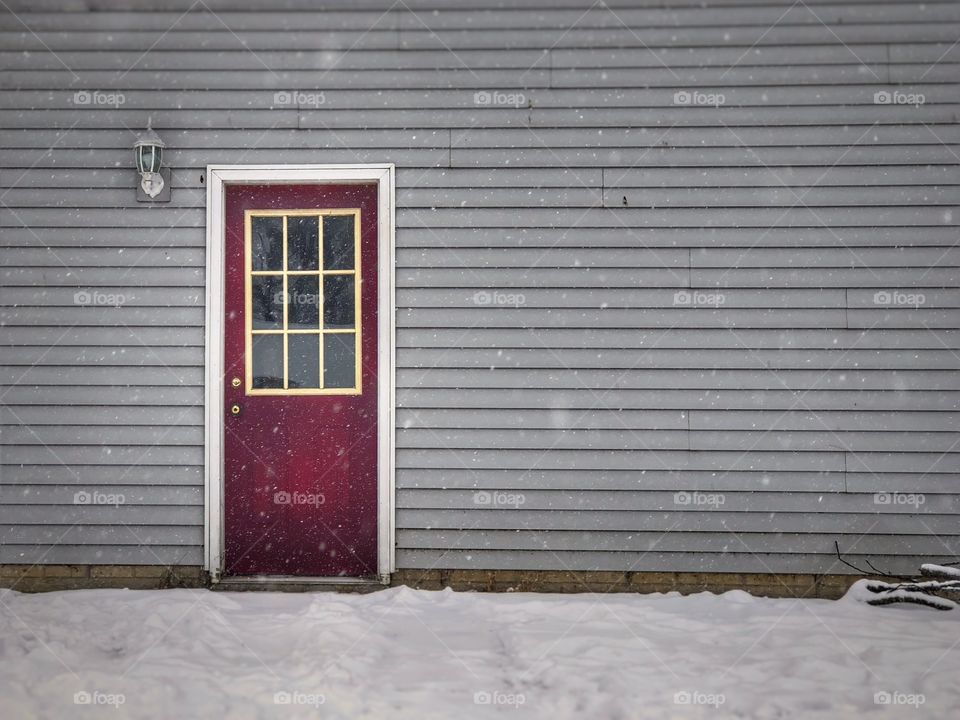 Red door in winter