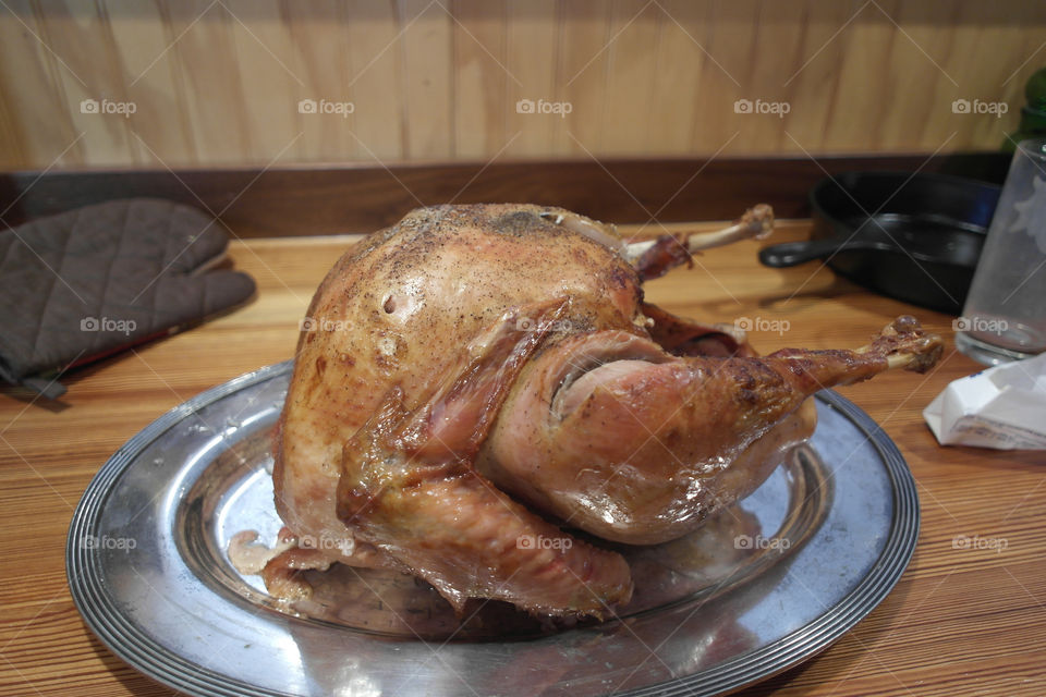 Delicious roasted chicken on steel plate