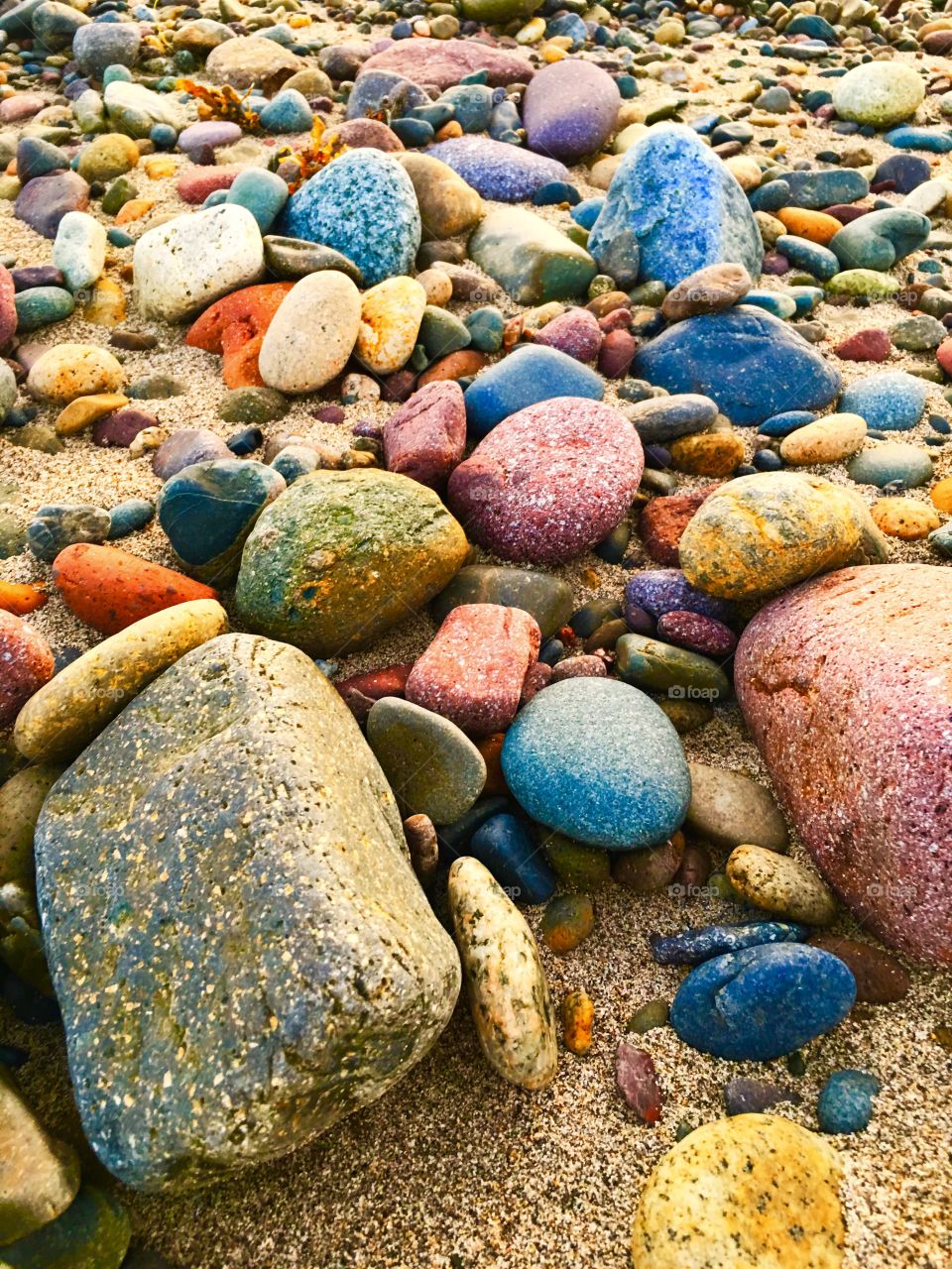 Colorful rocks and pebbles on the beach of Puerto Vallarta