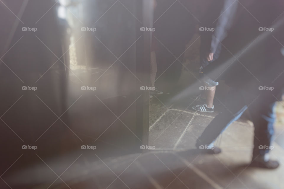 A storm is coming up and people seek shelter.