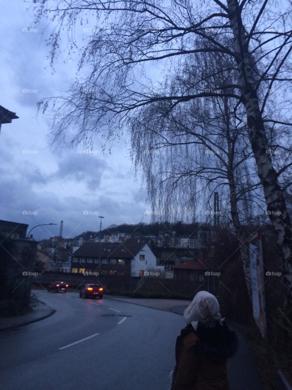 A picture of me walking down of a mountain in Germany on a winter night