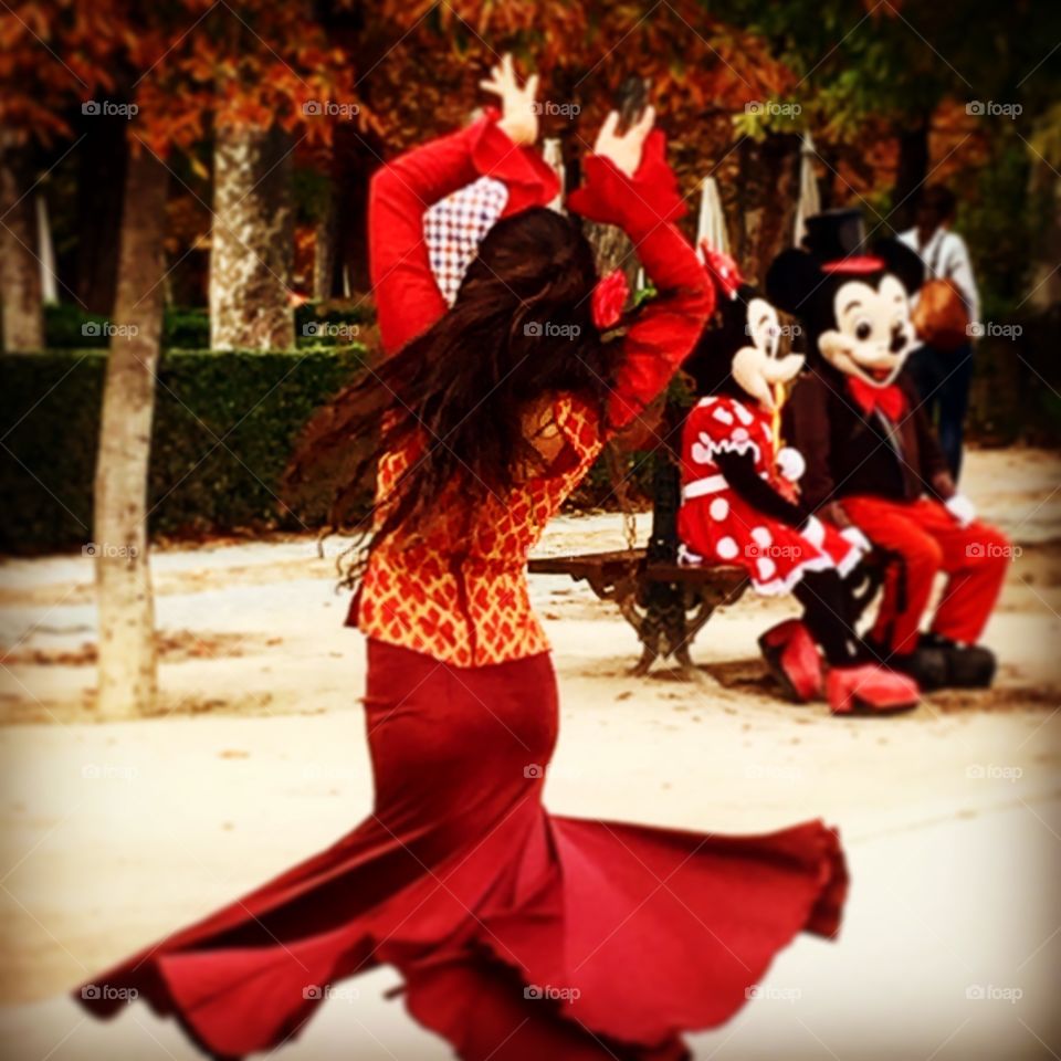 Traditional flamenco dancer  vs. Disney: a contrast