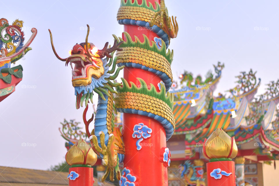 Dragon statue on the post at Chinese temple