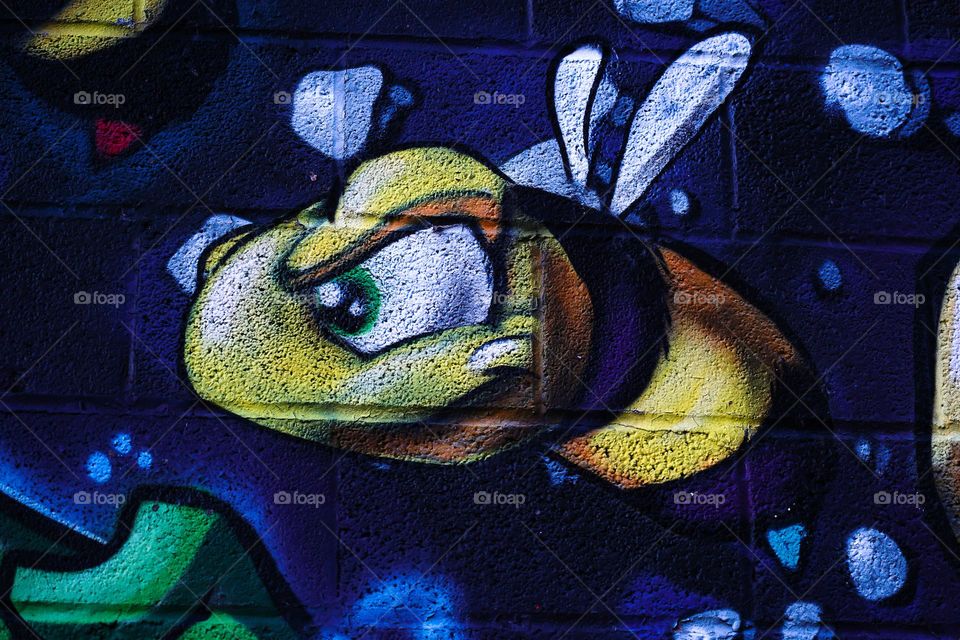 Bee. Small part of a larger mural