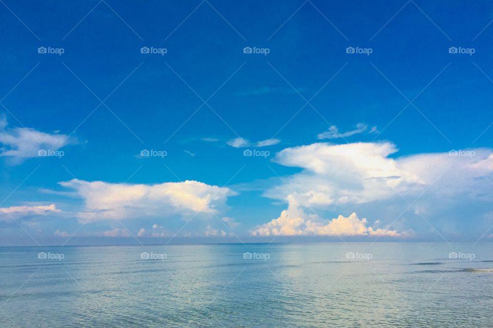 Seascape with brigh blue sky