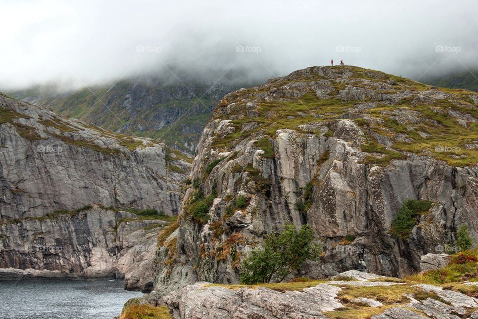 People hiking on mountain