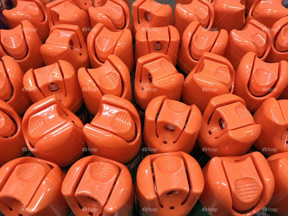 Display field of orange spray caps