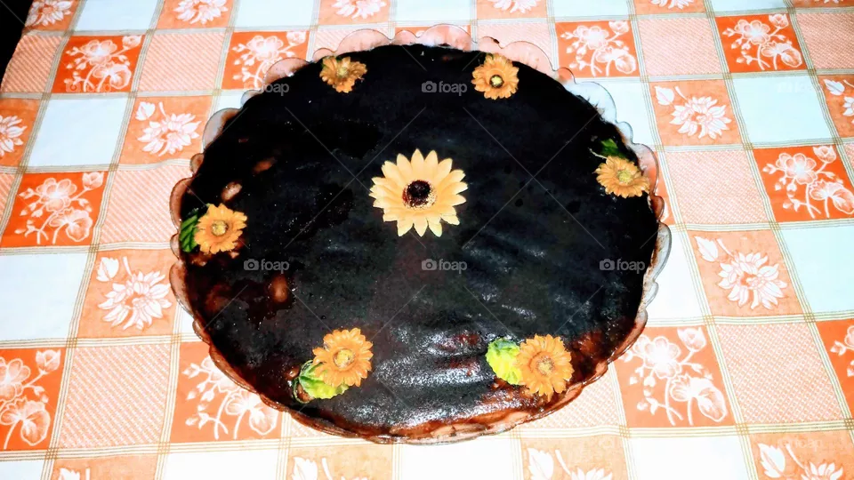 Homemade chocolate cake decorated with sunflowers