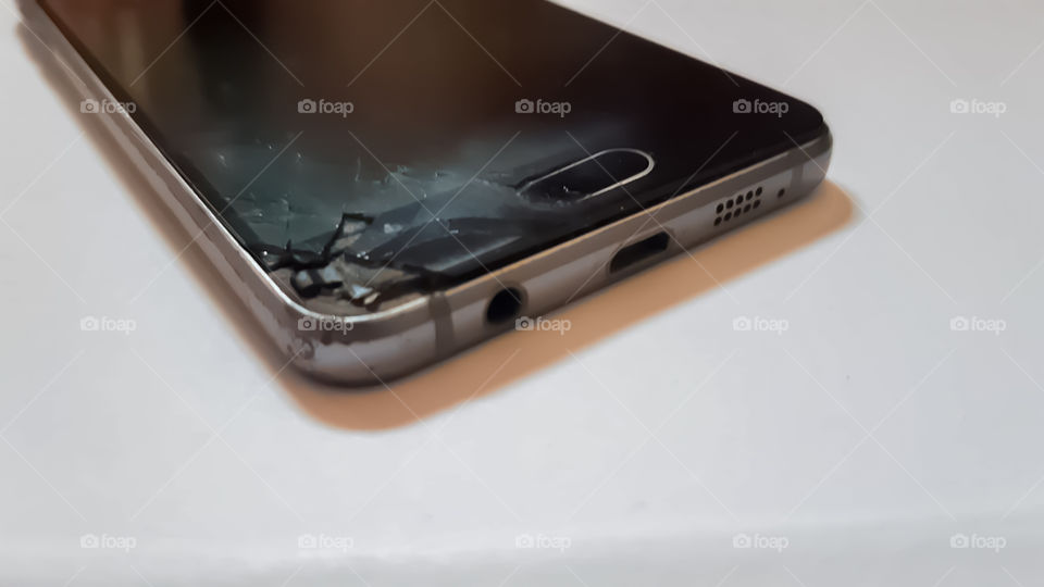 Samsung Galaxy A3 2016 cracked screen.