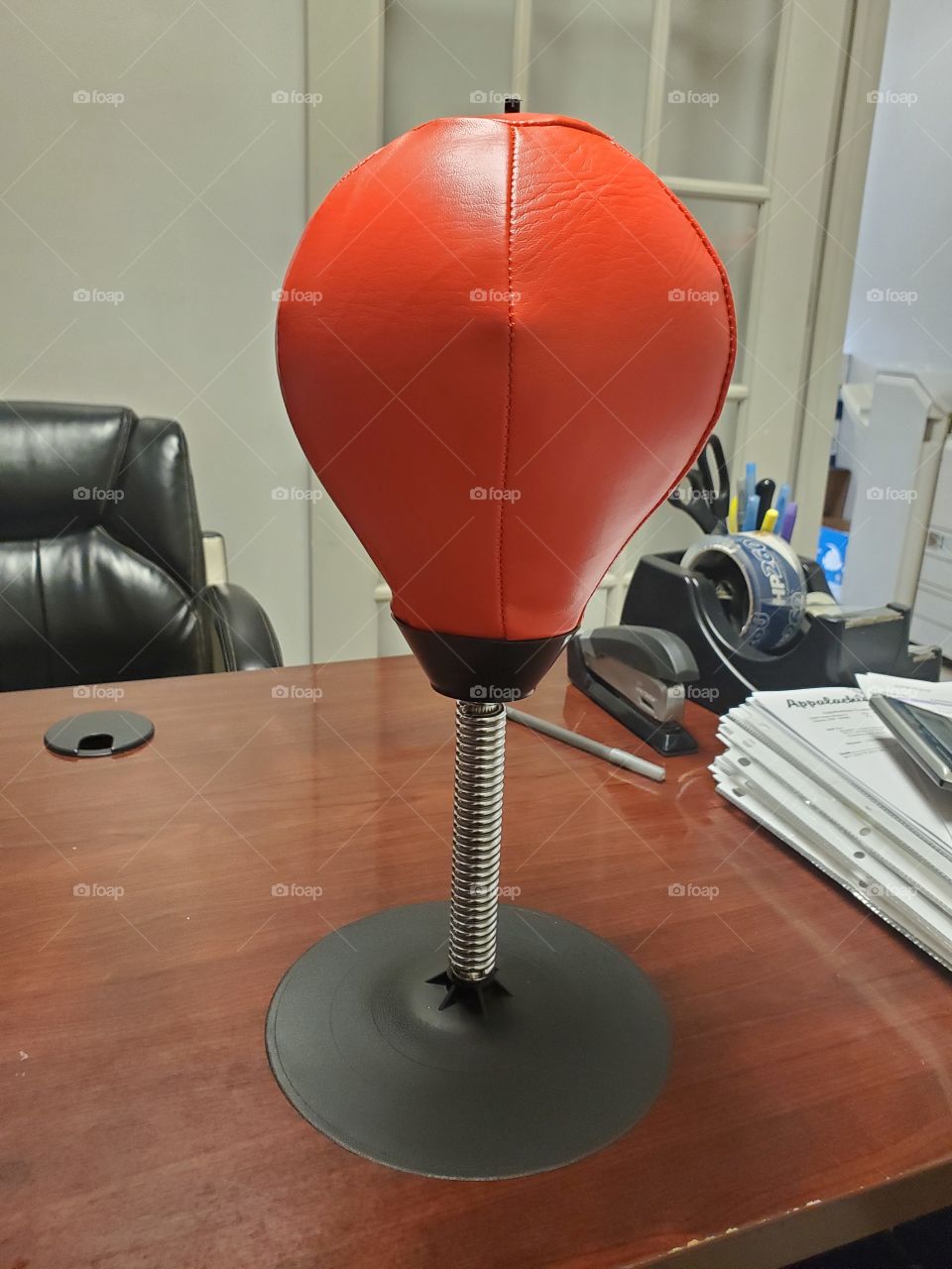 Tough day at the office - a desktop punching bag.