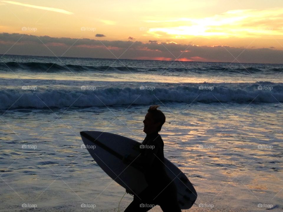 Pure Joy by surfer getting ready to ride those waves at Ocean Ridge Florida