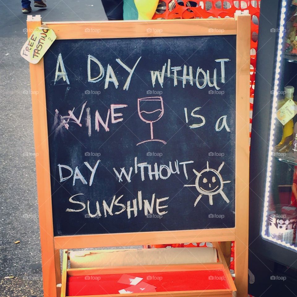 Wine = Sunshine. An funny quote outside of a restaurant in Rome, Italy