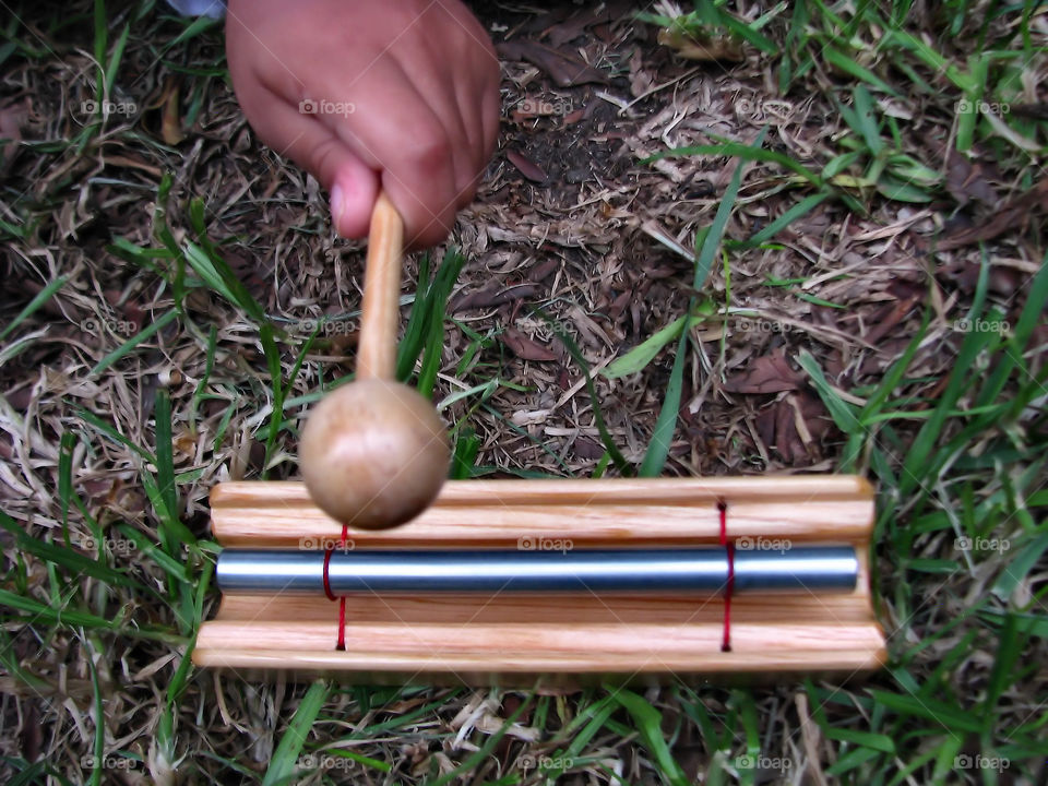 Fingerboard and hand. Fingerboard at garden.