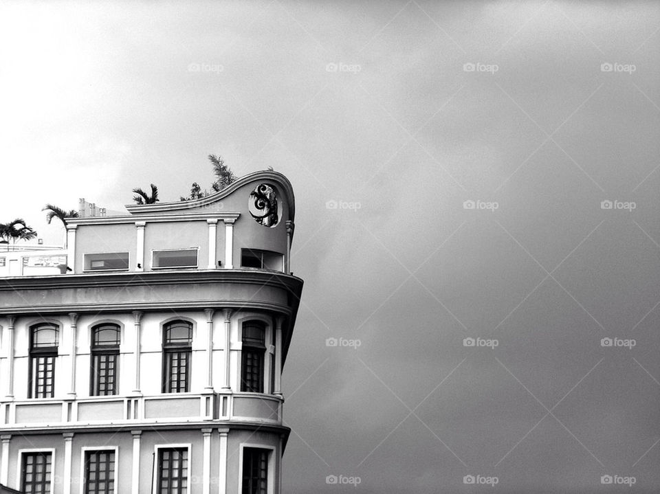 Building exterior and cloudy sky