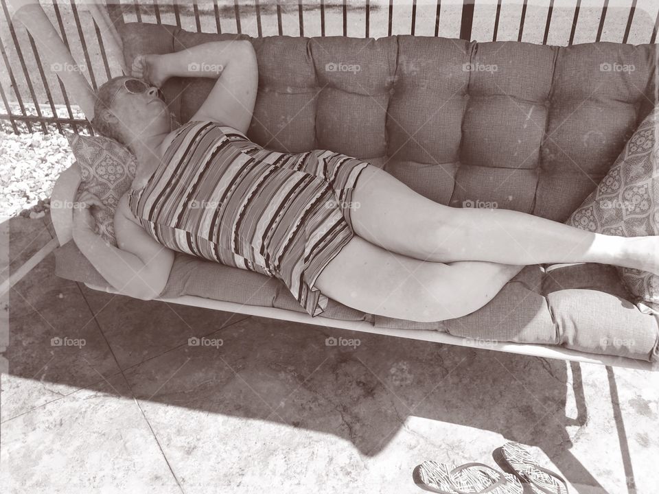 Relaxing by the pool