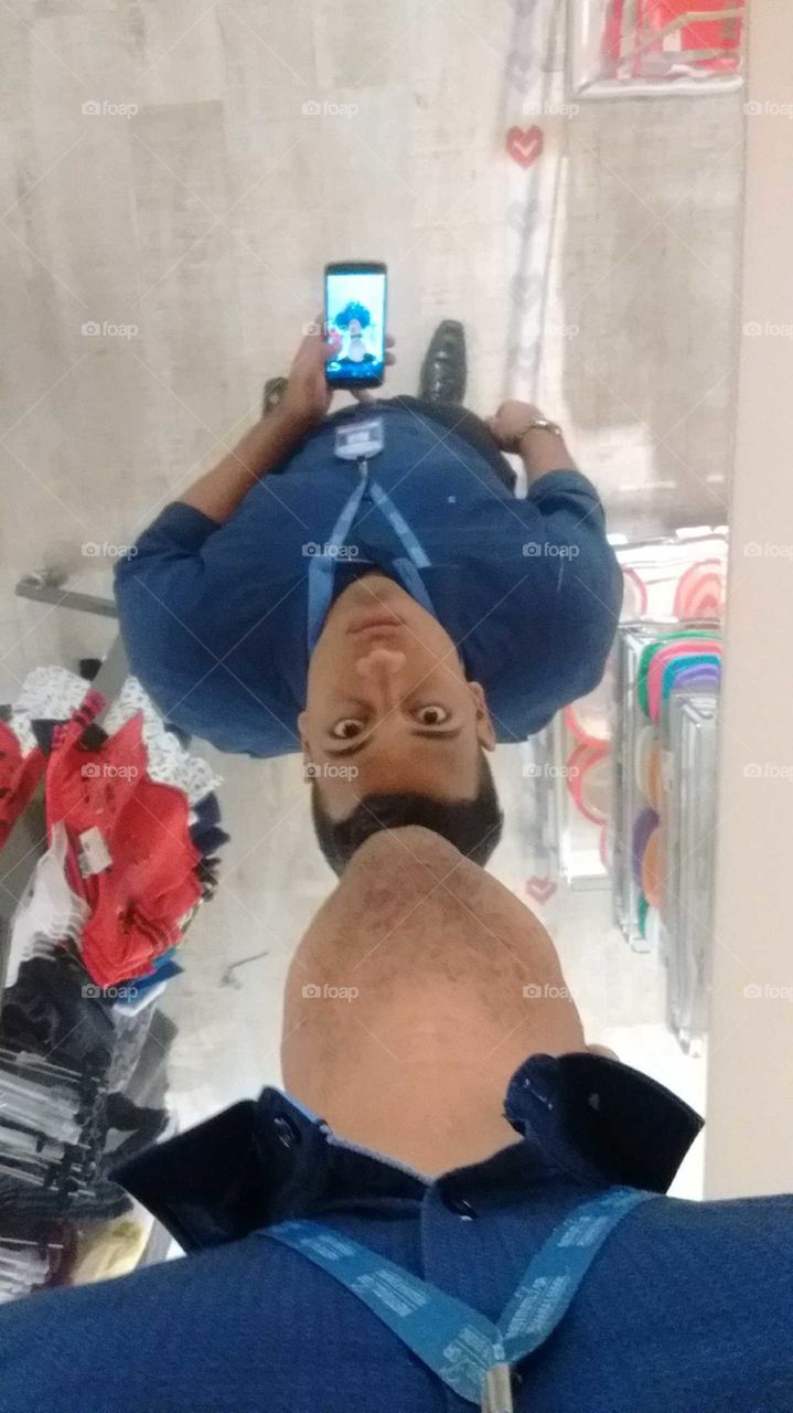 Clothes store. Mirror Face