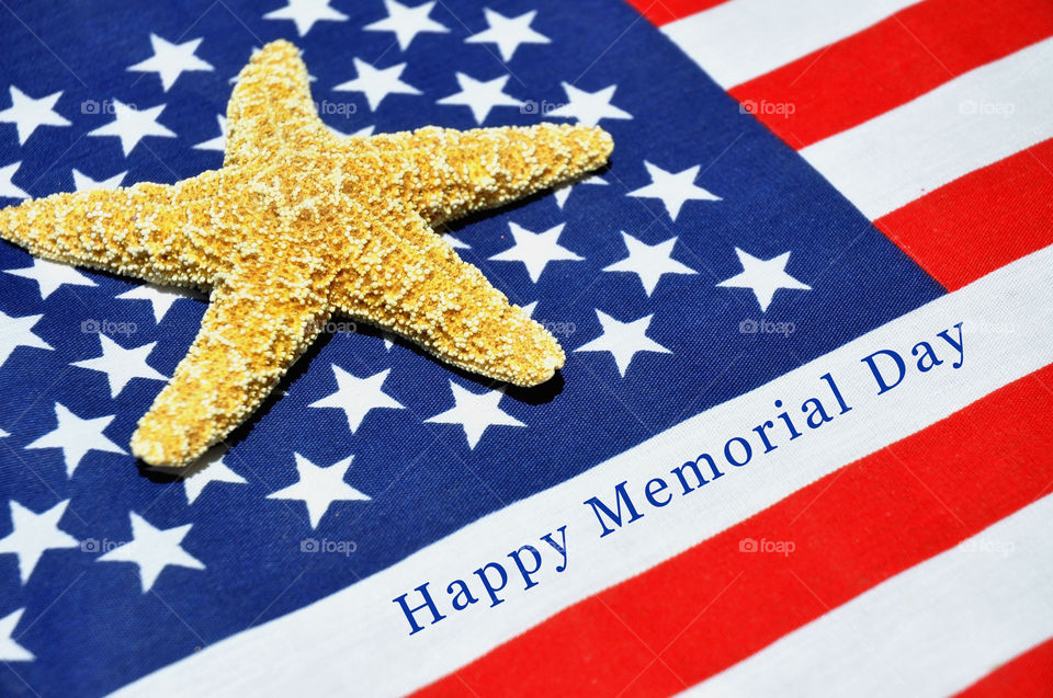 Memorial Day concept. United States flag with a starfish on it. 