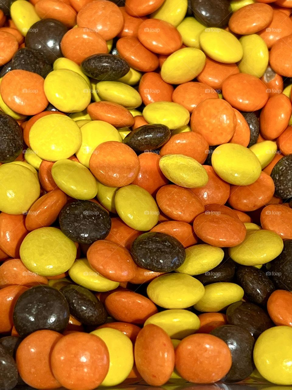 Multicolored candies dragees close up. Background