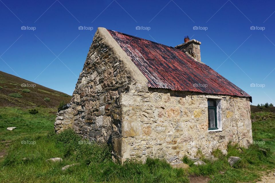 A Bothie sitting on a mountain in the Highlands ofScotland on a HOT blue sky day ... a rare picture in Scotland but the sun always shines for me 😉