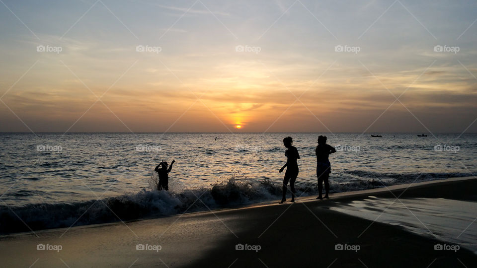sunset and friends at the beach