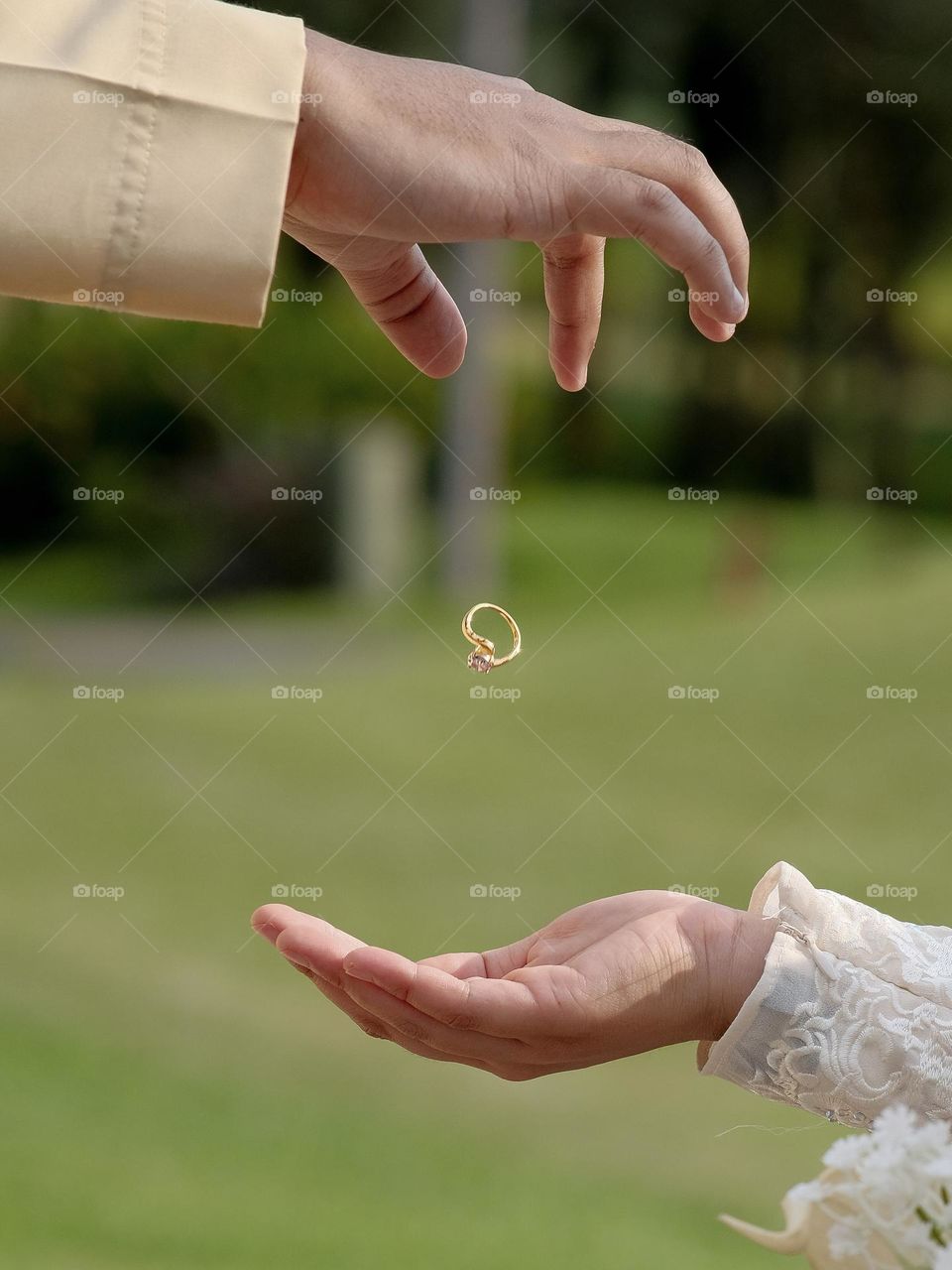 engagement ring,ring symbolics during outdoor sessions.