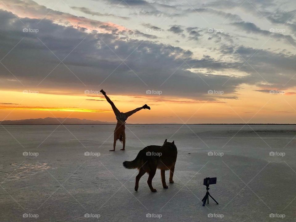 Having fun on the salt flats at sunset 