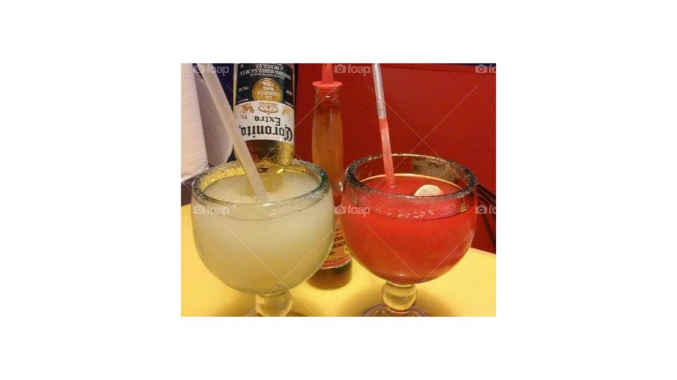Frozen strawberry and lime margarita's. An Arizona favorite to beat the summer heat. We enjoy them in December too...@ Fuzzy's taco shop Tempe, Arizona.