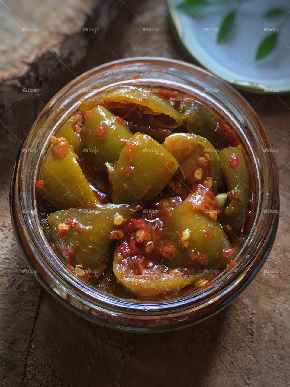 Homemade sweet and spicy lime pickle .