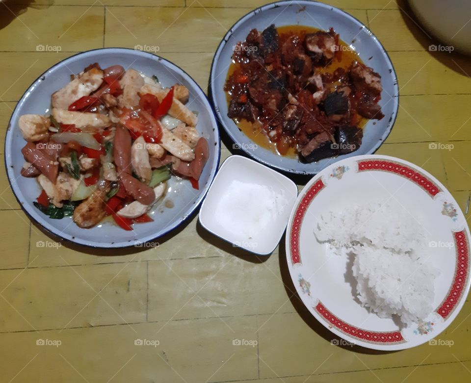 Three kinds of food on plates